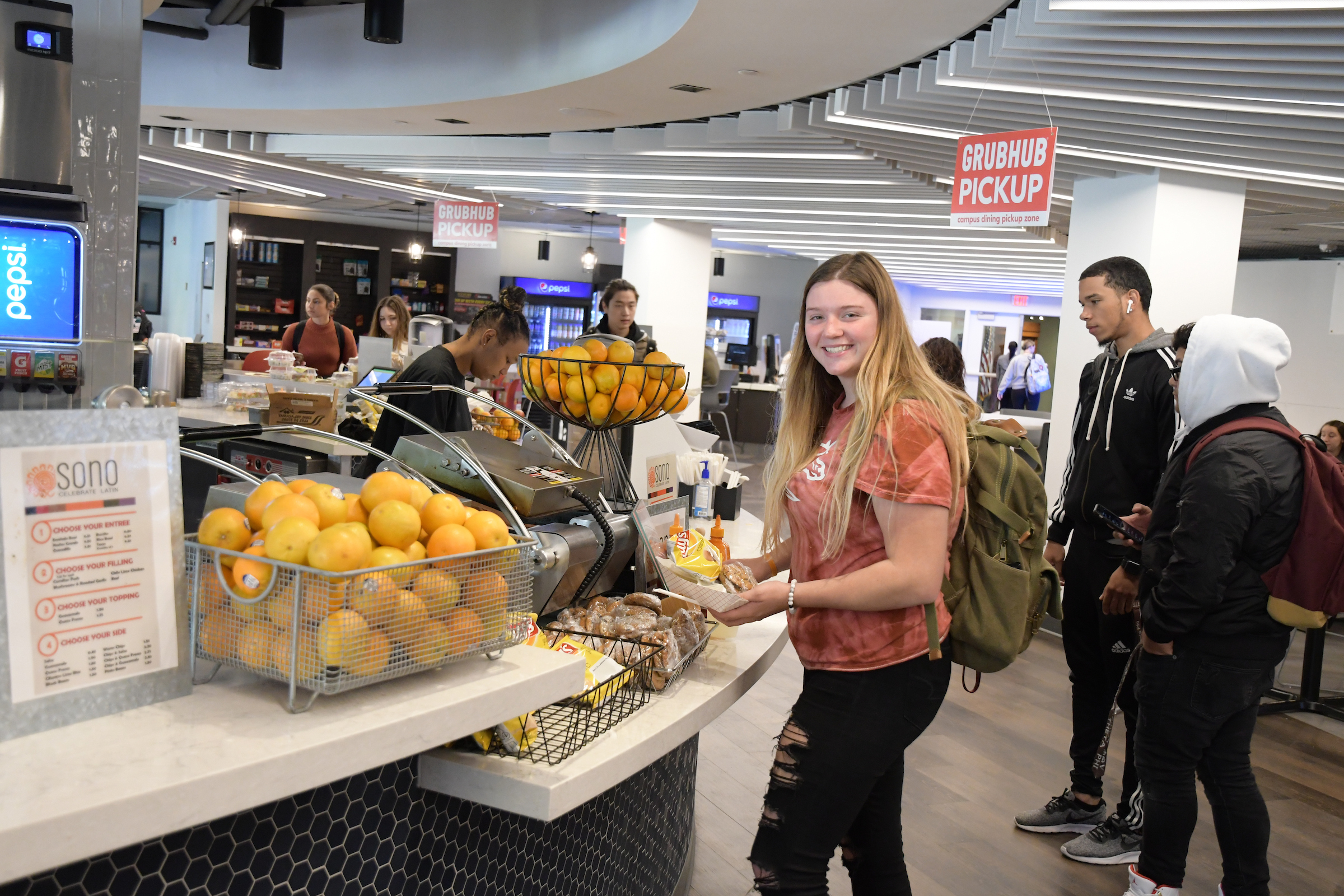 Students pick up grab-and-go meals
