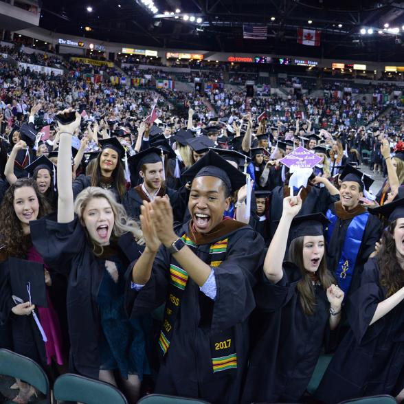 Students celebrating Commencement