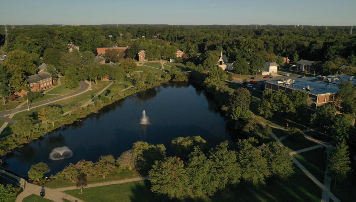 Aerial view of campus with lake