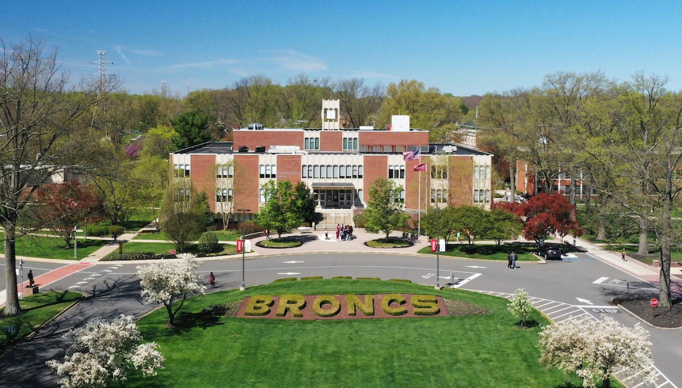 Aerial view of the campus mall and Moore Library