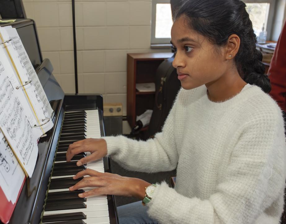 Conservatory student plays the piano.
