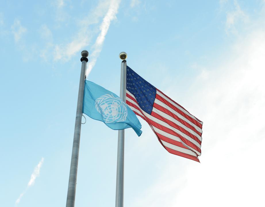 United Nations flag and American flag on poles