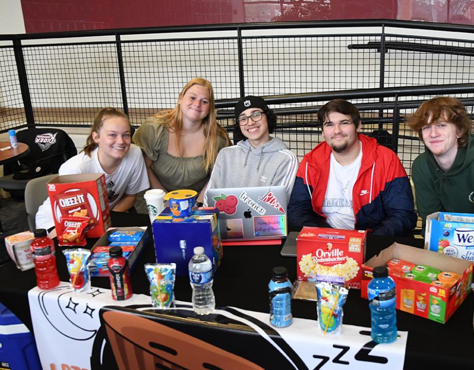 Students selling products at Business in Action Market Fair
