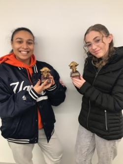 Diorys Jimenez, ‘24 and Bella Frost, ‘25 posing with Mock Trial awards