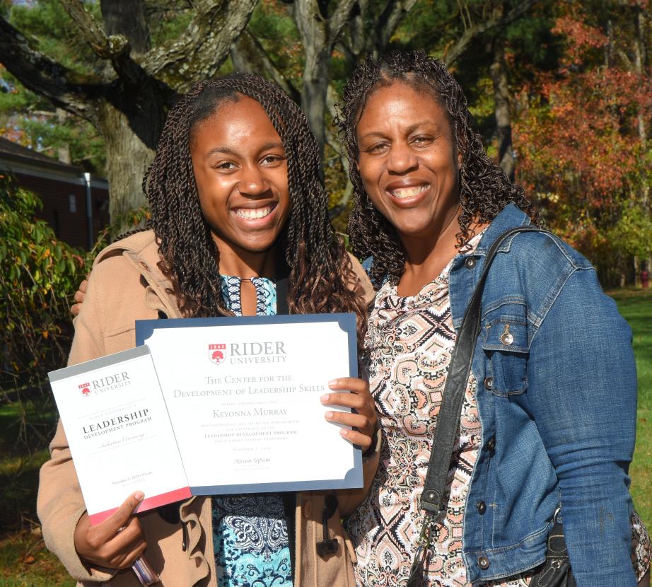 Mother and daughter celebrate her leadership skills