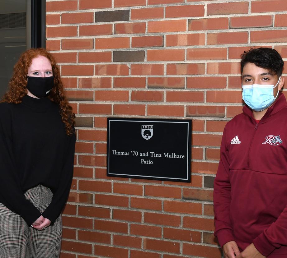 Masked students on Rider's campus