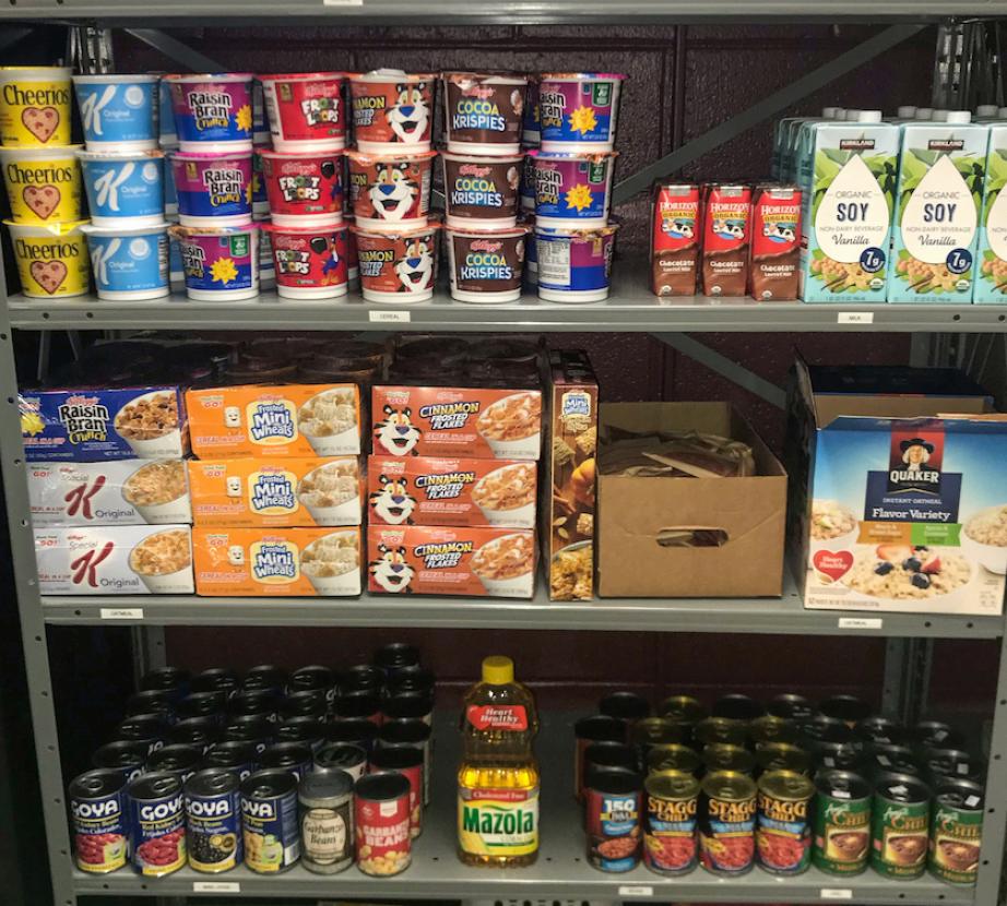 Shelves of food in food pantry.