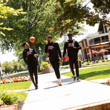 Student athletes walking to the library
