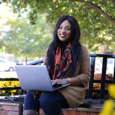 Young woman using laptop