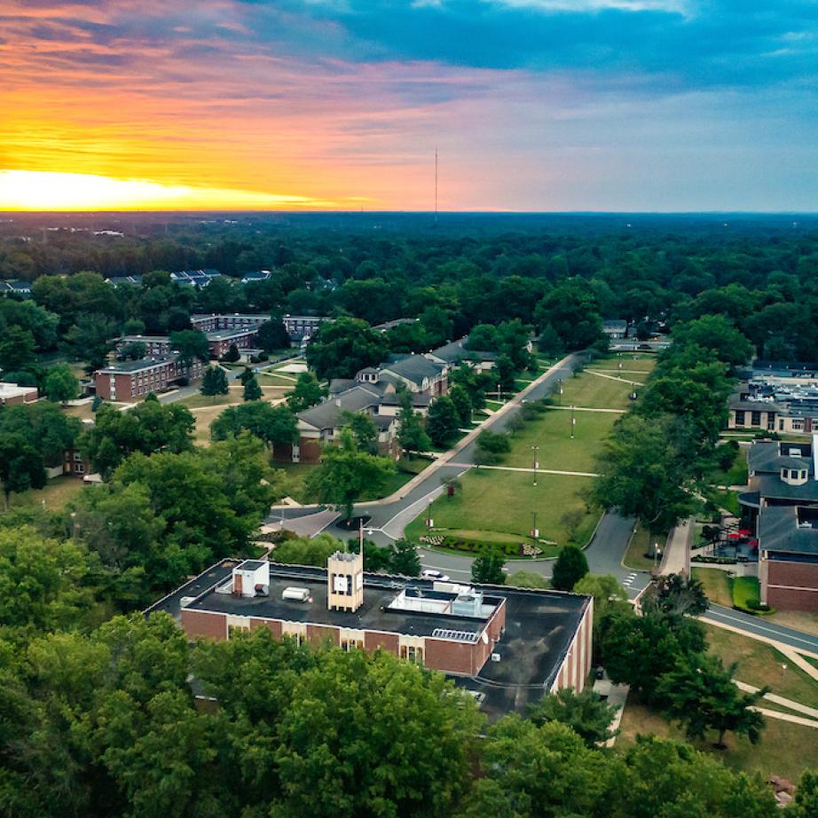 Bird's eye view of sunrise over campus